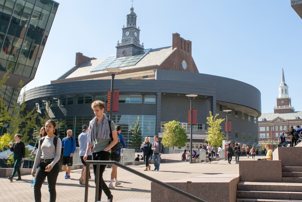 Students walk on campus in the MainStreet area.